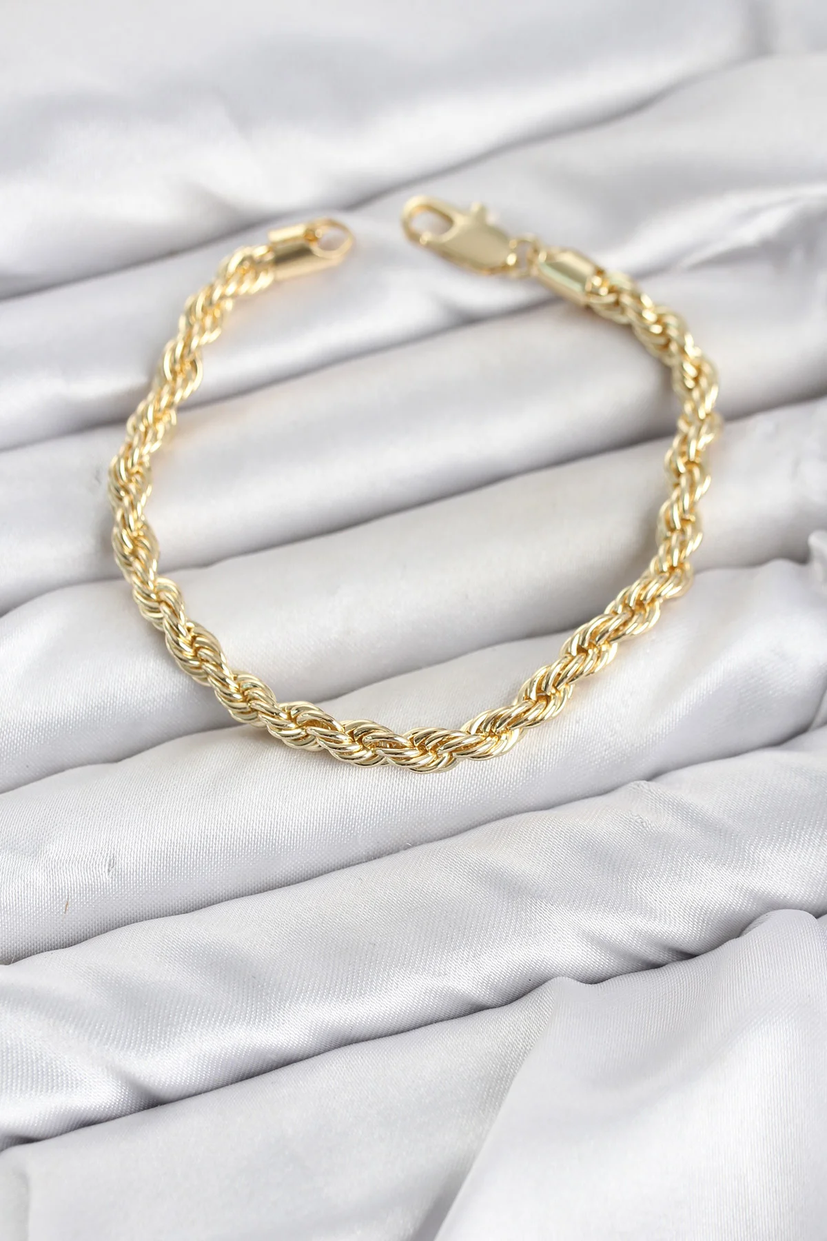 Tegan CM Burgu Model Gold Renk Pirinç Kadın Bileklik TG27BB8591